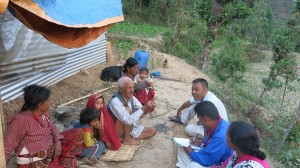 Photo Bal Bahadur and his family with the Caritas Nepal staff (Credit Caritas Nepal)